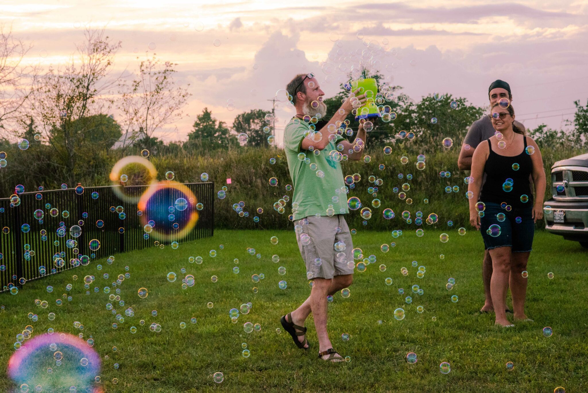 A man with a bubble machine at Golden Hour Fest