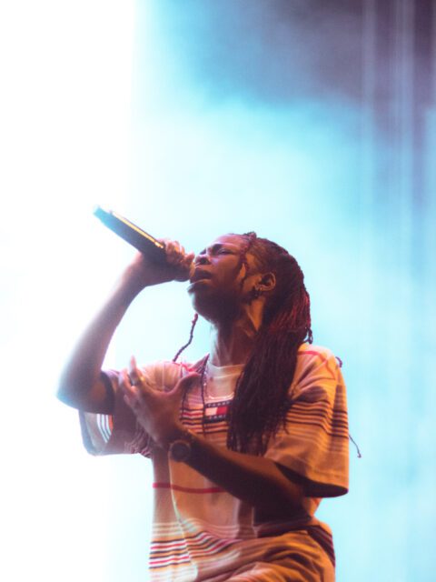 Photo of Haviah Mighty rapping on stage