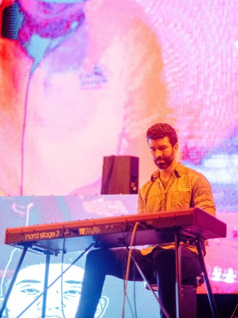 Photo of keyboardist in re.verse on stage